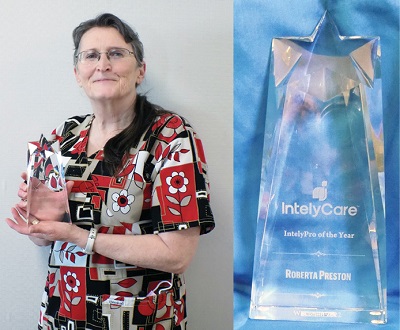 Roberta Preston pictured with her Intelycare award