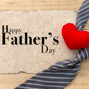 Father's day image with red heart and tie
